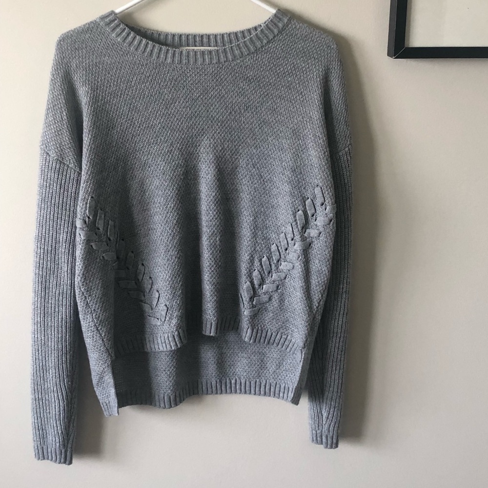 Grey sweater, with braided sides